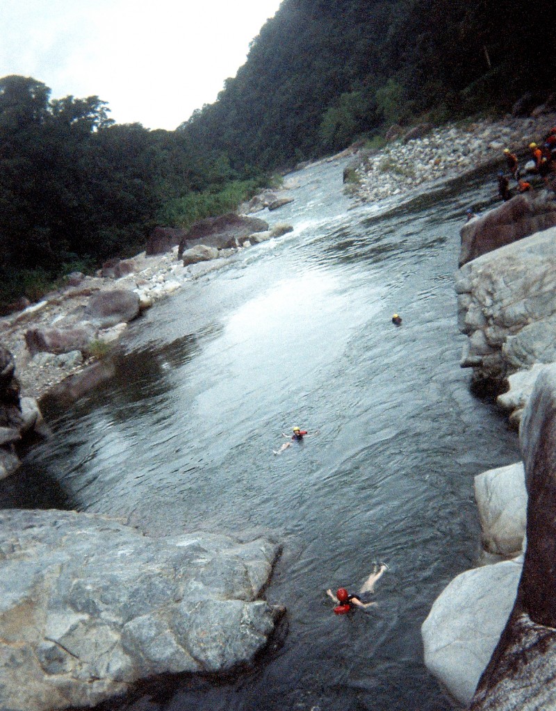 Floating in the river.