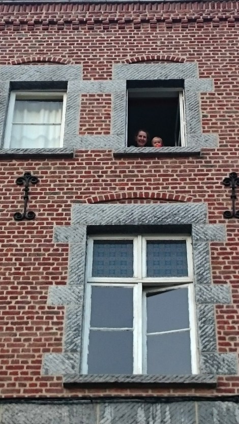 We knew it was our cue to head back when we saw Grandma and baby Paige saying hi out the window. (Belgium circa 2015)